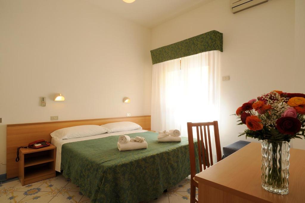 Hotel Delfino Лайгуэлья Номер фото